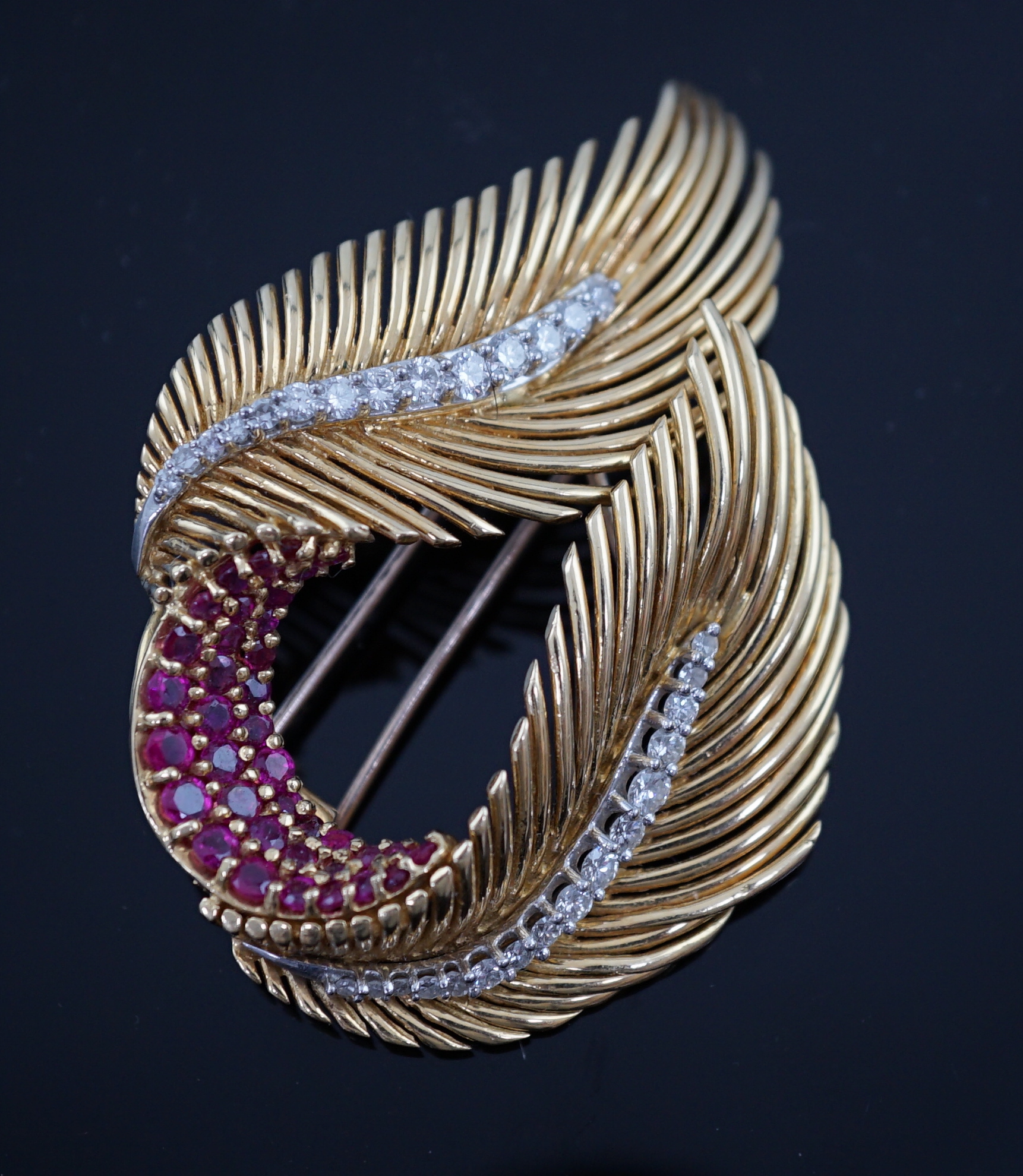 A 1960's Kutchinsky 18ct gold, ruby and diamond cluster set double fern clip brooch
